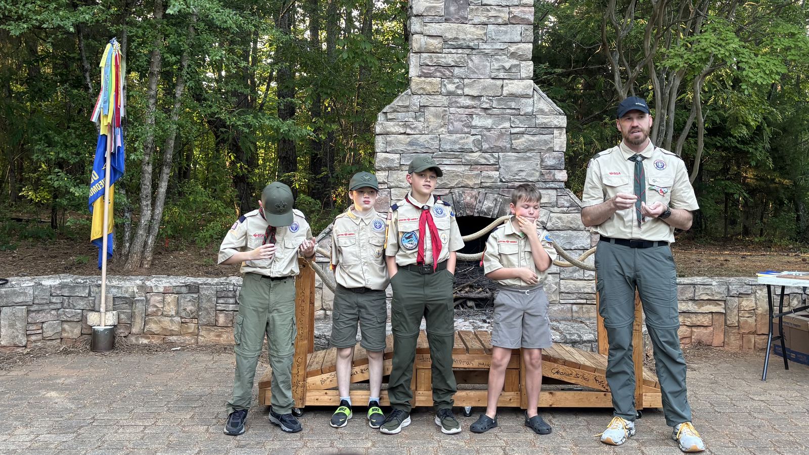 Pack 83 scouts and a leader in uniform at Beatty&rsquo;s Ford Park, May 2026